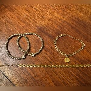 Set of 4 gold bracelets